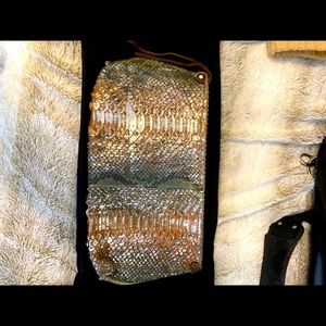 B May alligator clutch